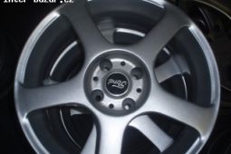 Prodám alu kola Ford 15 , 4 x108 gumy